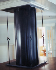 blackened and lacquered chimney cover