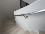 curved staircase to upper level